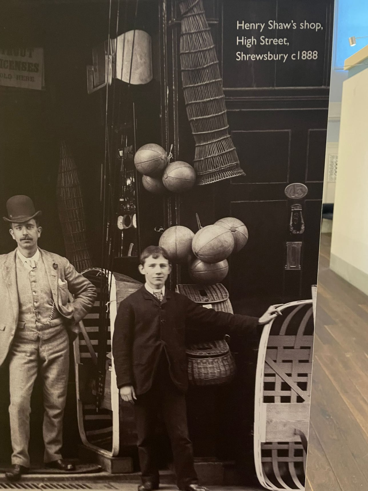 Fishing tackle shop in Shrewsbury showing a coracle, fish trap and bait baskets